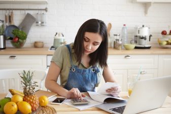 woman looking over her budget