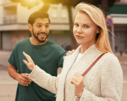 blonde woman ignoring a man