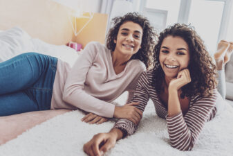 Happy woman on bed