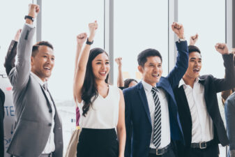 office workers celebrating