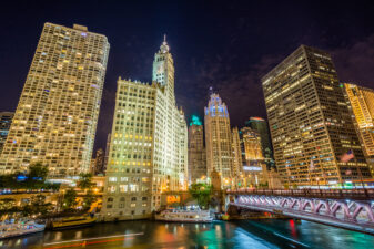 Buildings along the Chicago River at night, in Chicago, Illinois