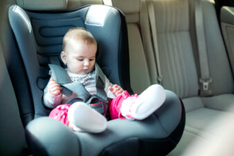 Baby sitting in car seat