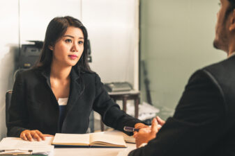 businesswoman and man in a meeting