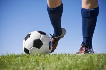 Kicking a soccer ball