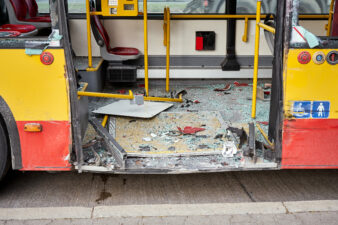 View of devastated city bus after road accident