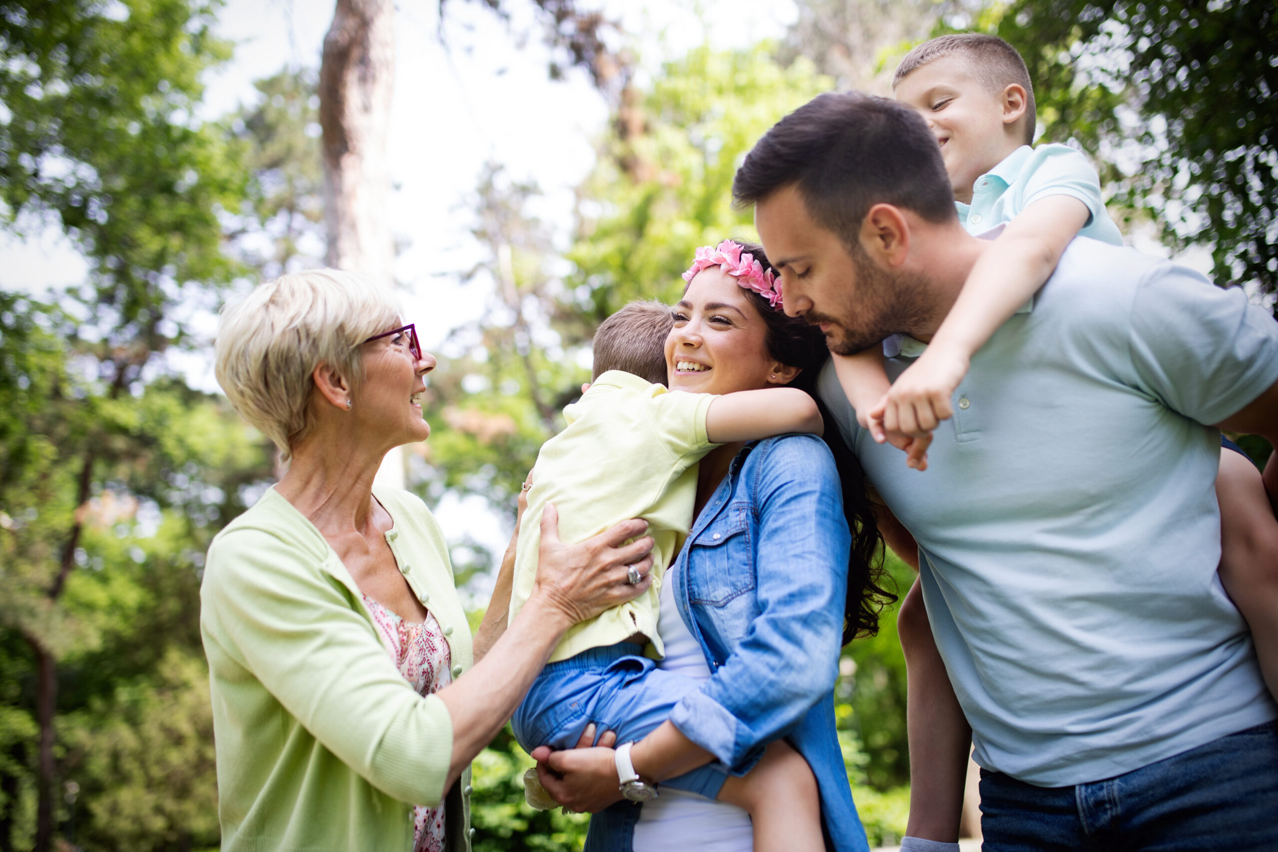 happy family walking outside together