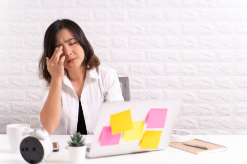 Frustrated woman at desk