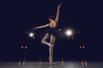 back view of a ballet dancer on stage