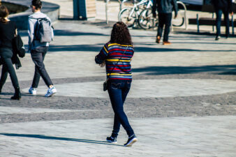 Woman walking downtown