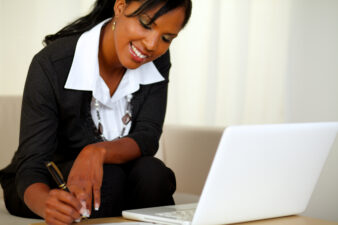 Black woman working at her desk