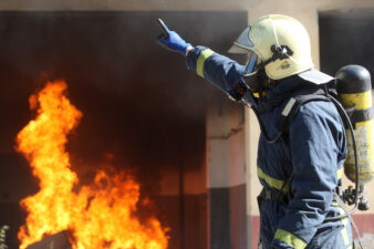 firefighter going into a burning building