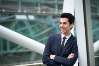 young businessman crossing his arms