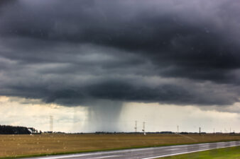 Storm clouds over the road