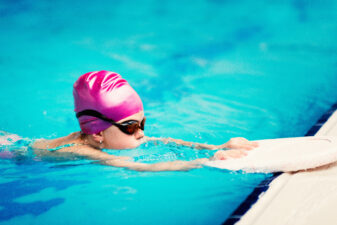 Little girl in swimming training