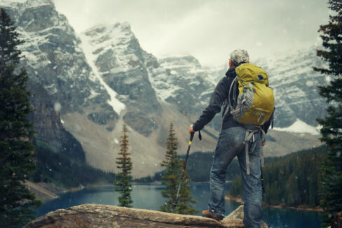 Hiker in snowy mountains