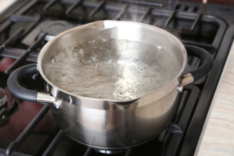 Pot of boiling water on stove