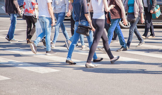 pedestrians walking on a crosswalk