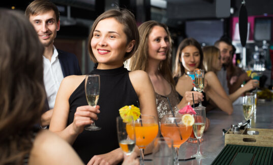 Girl speaking with colleagues