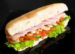 sandwich with ham, mushrooms and vegetables