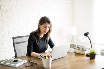 Woman sitting at her desk