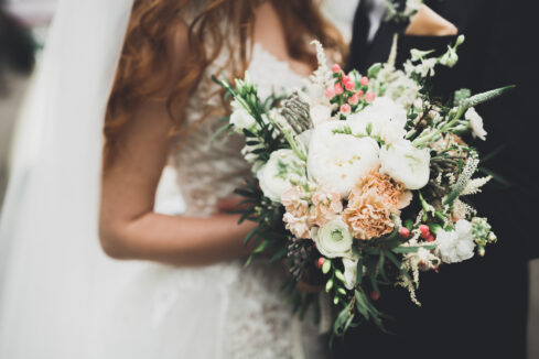 bride holding a wedding bouquet