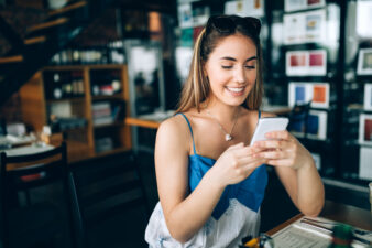 brunette woman on her phone