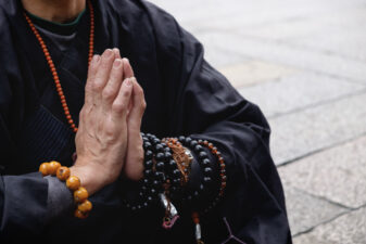 Buddhist Monk Praying