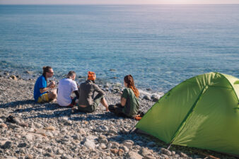 Hikers camping on the beach