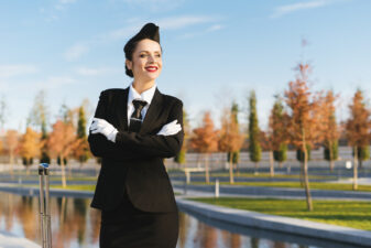 happy smiling stewardess posing