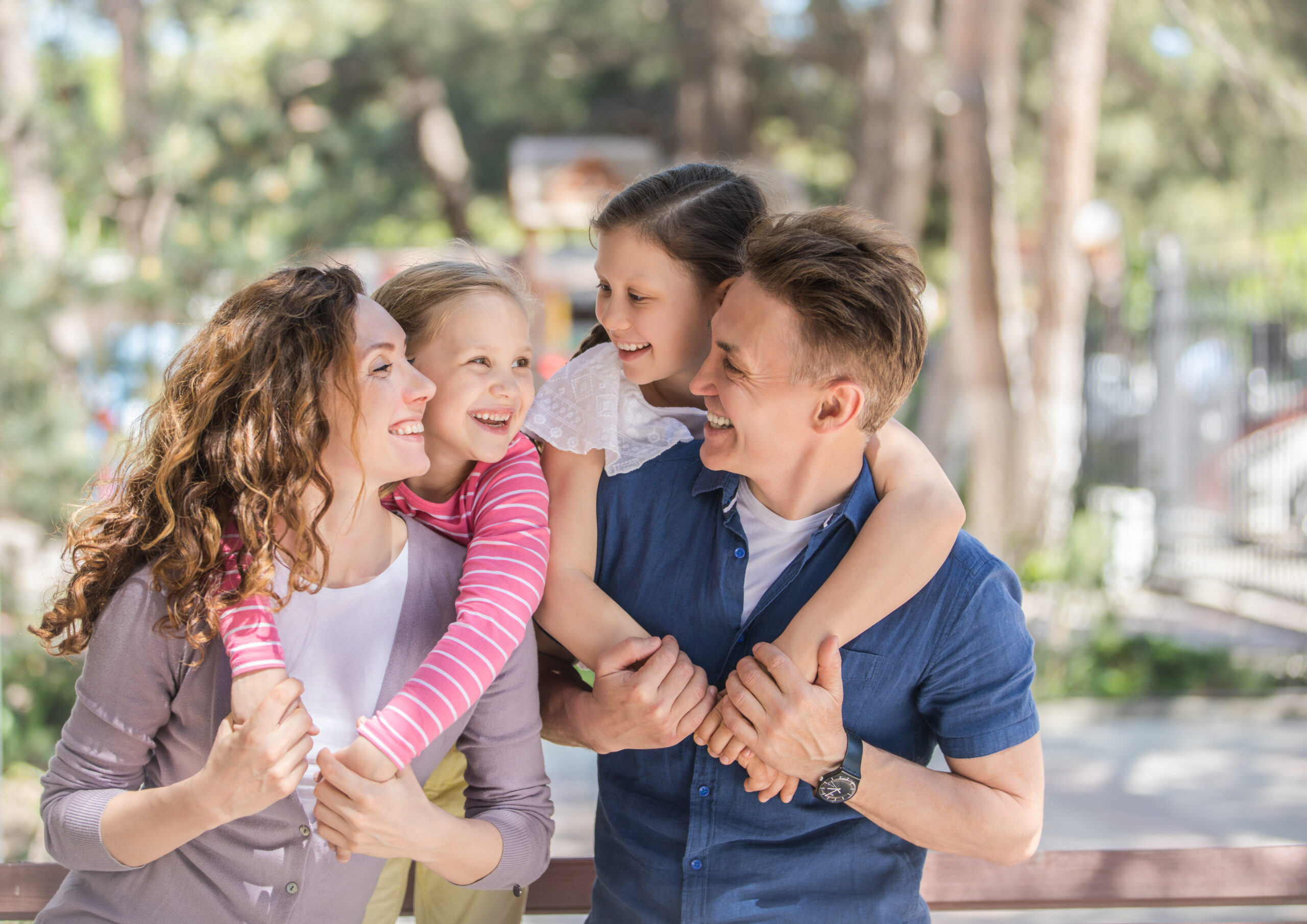 happy family with two daughters