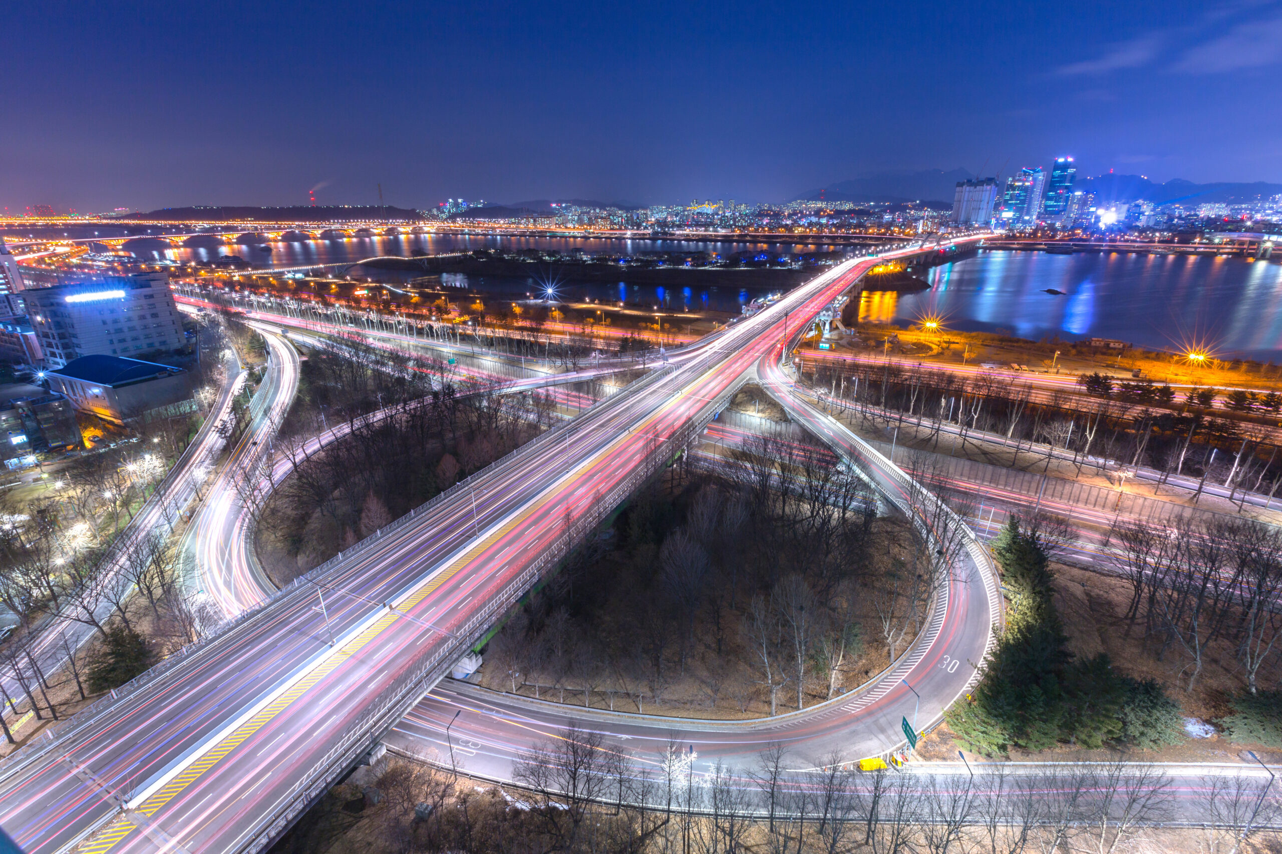 Korea travel, Cars passing in intersection, Han River and bridge