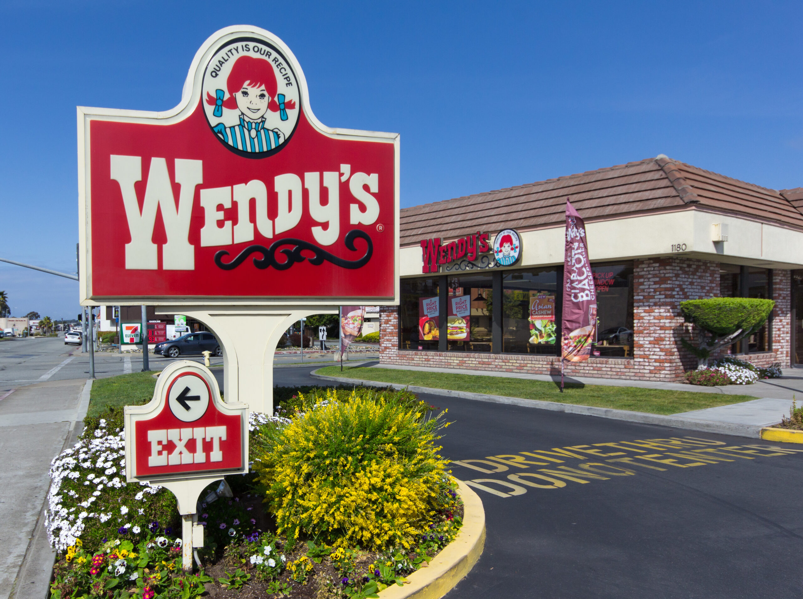 SEASIDE, CA/USA - MARCH 27, 2014: Wendy's fast food restaurant exterior and sign. Wendy's is the world's third largest hamburger fast food chain with approximately 6,650 locations.