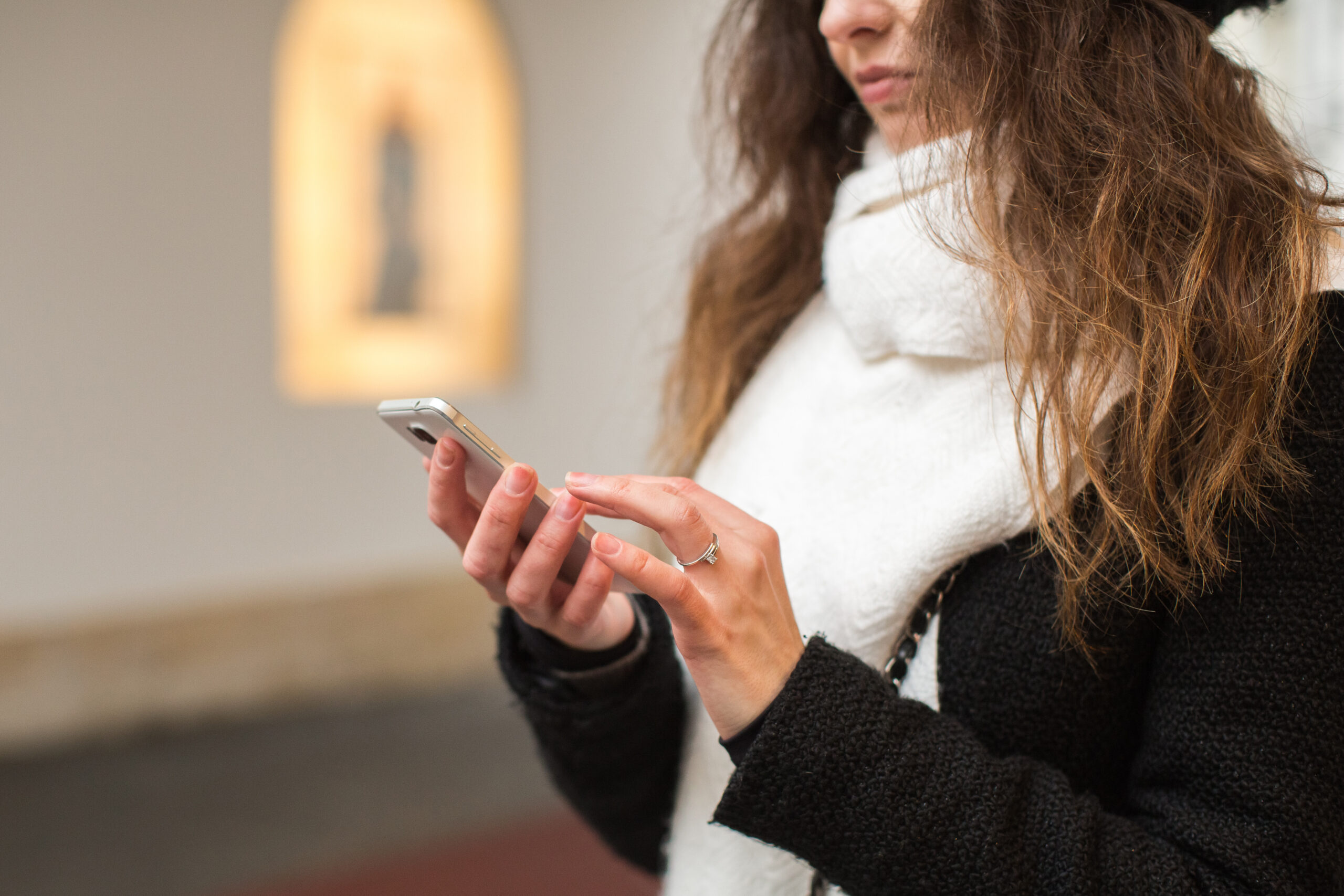 girl holding phone in his hand