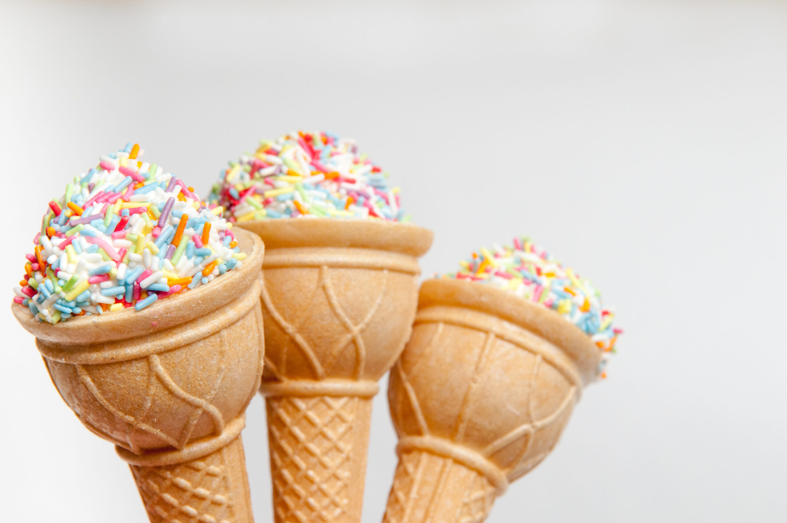 vanilla ice cream cones with sprinkles