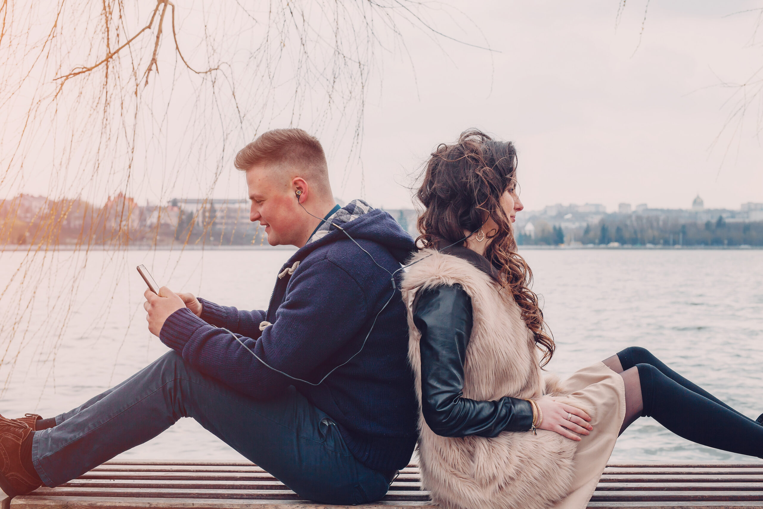 couple in love walking around the city and the river