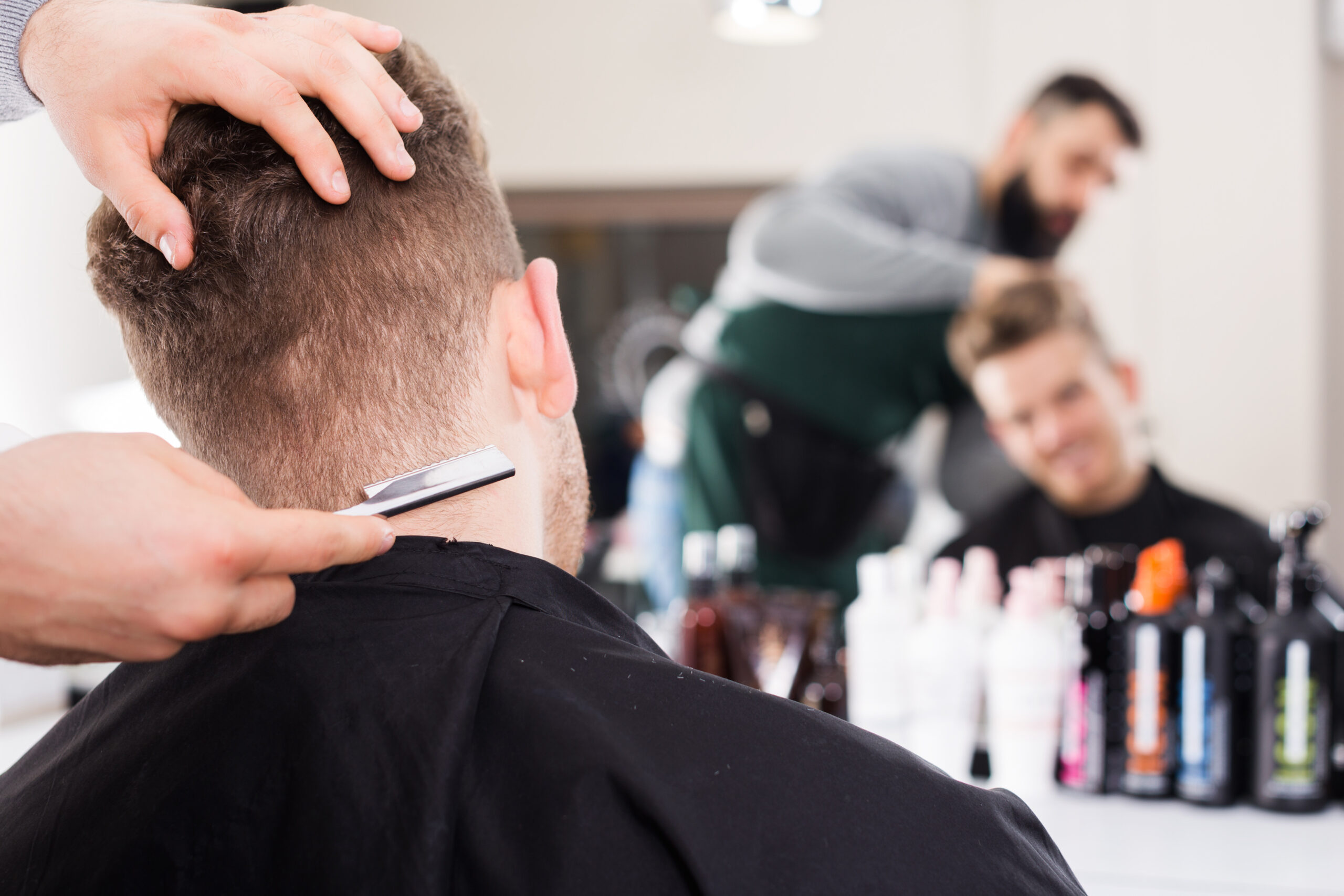 Hairdresser doing new haircut