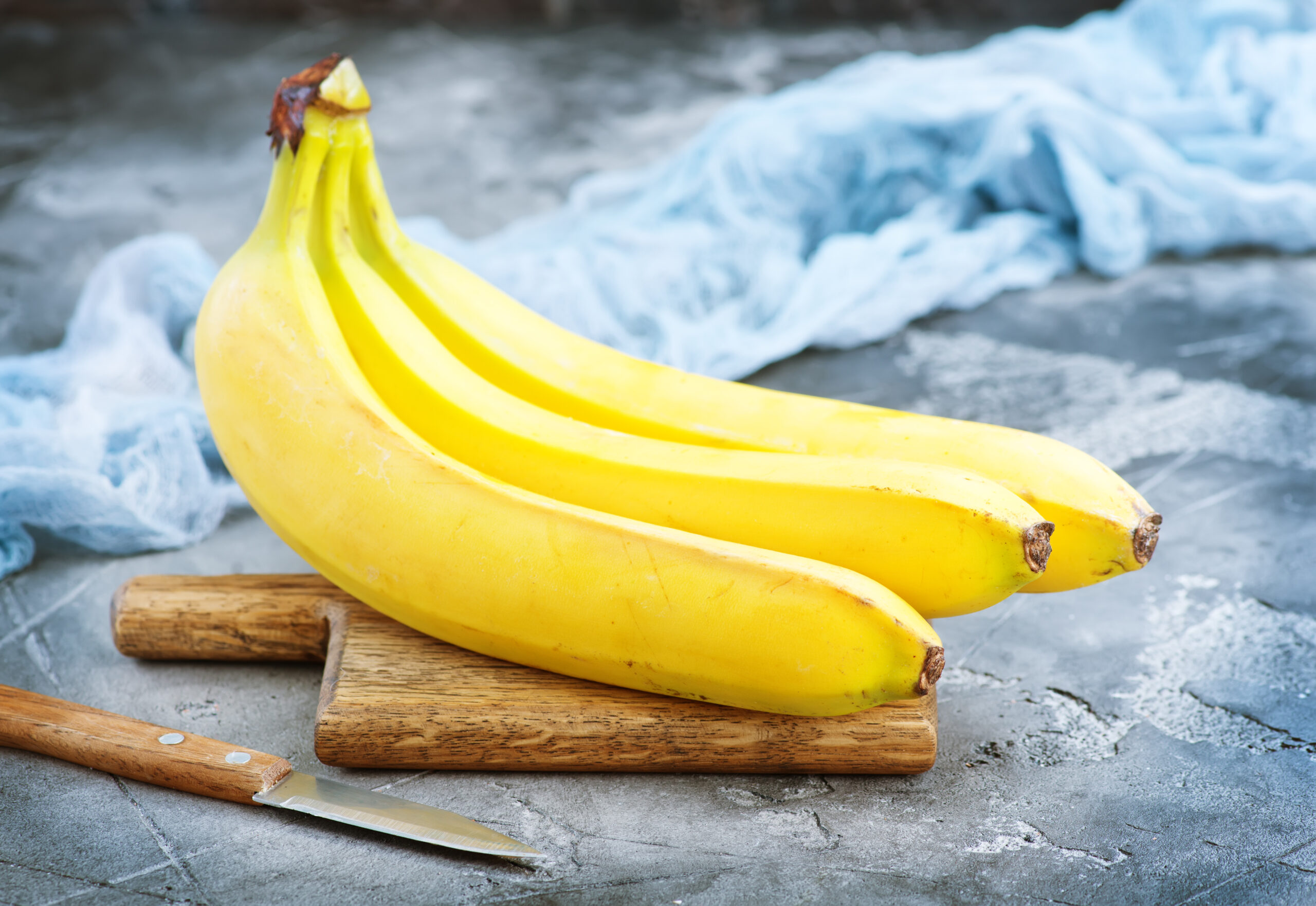 bananas on a cutting board