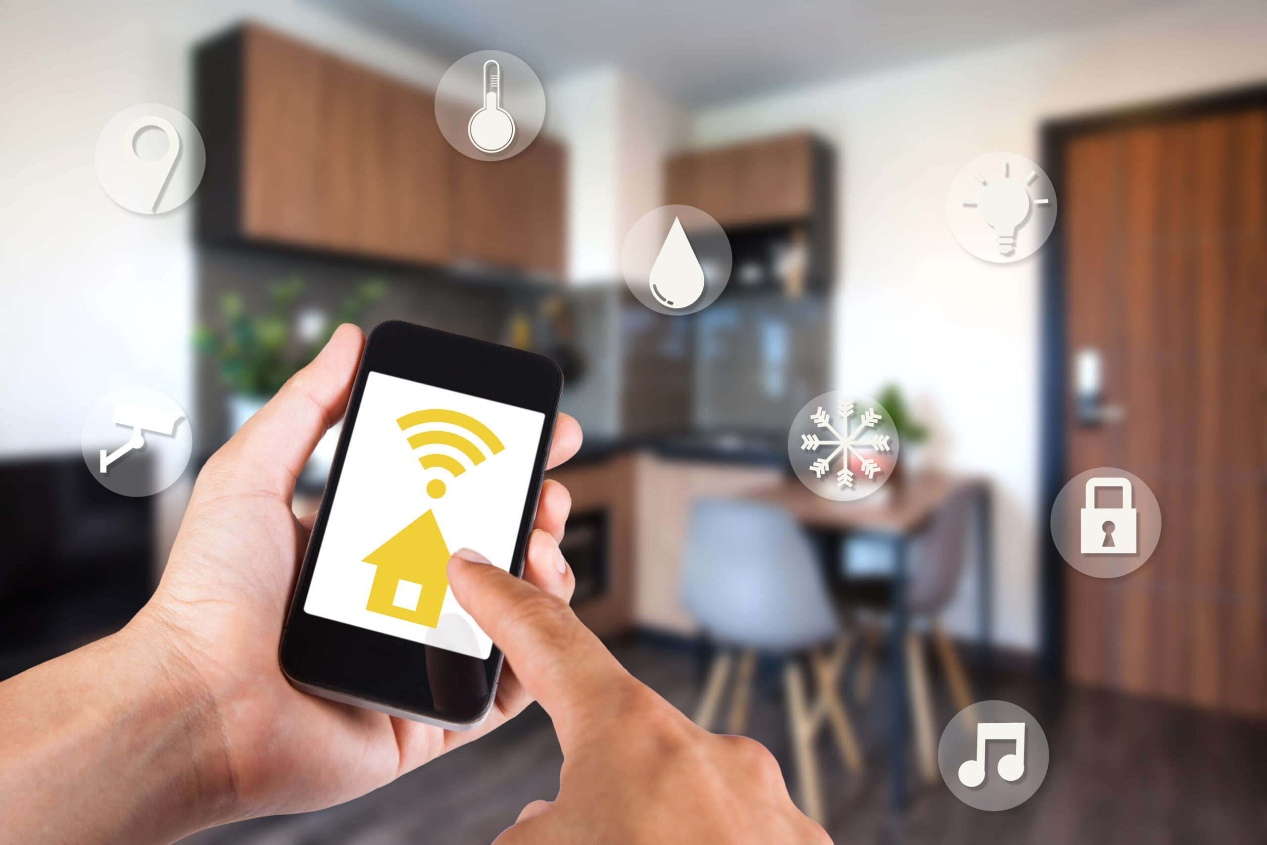 Hand using smartphone by app smart home on mobile