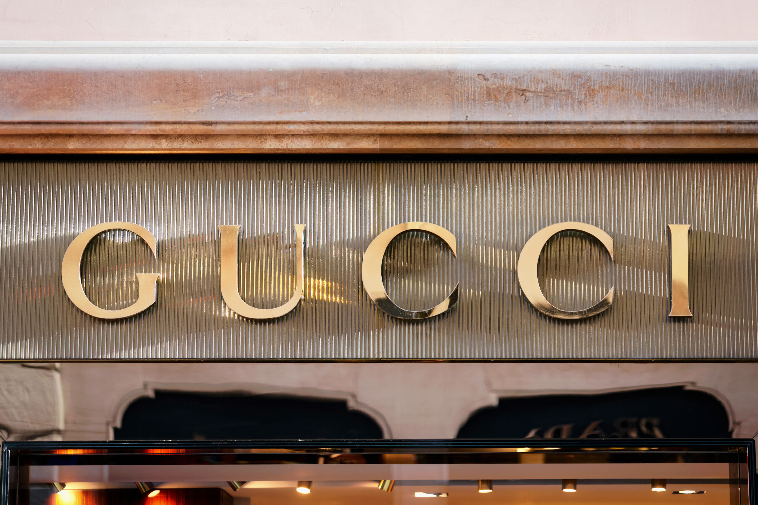 Gucci Sign on street shop window Rome