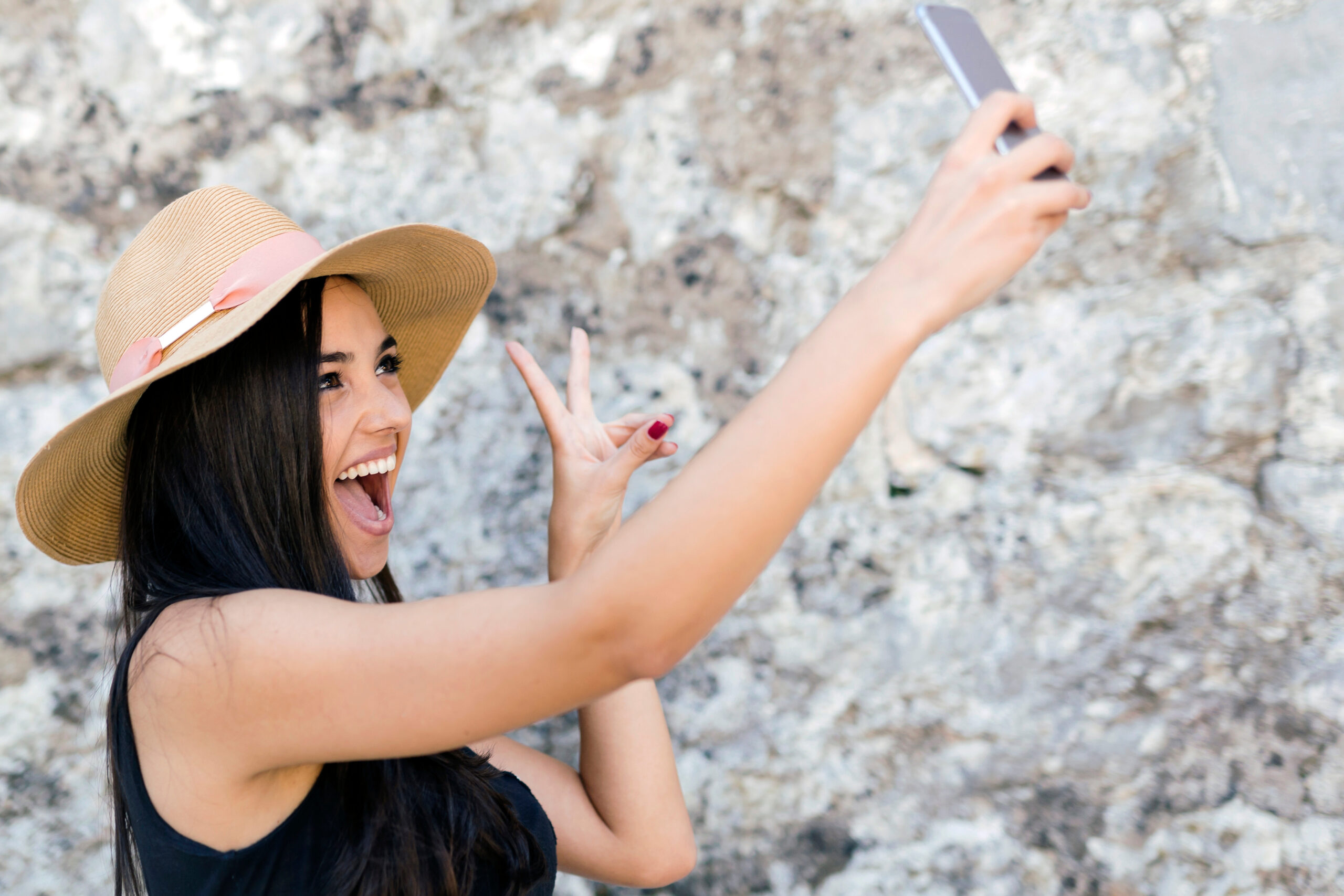 Beautiful girl taking a selfie