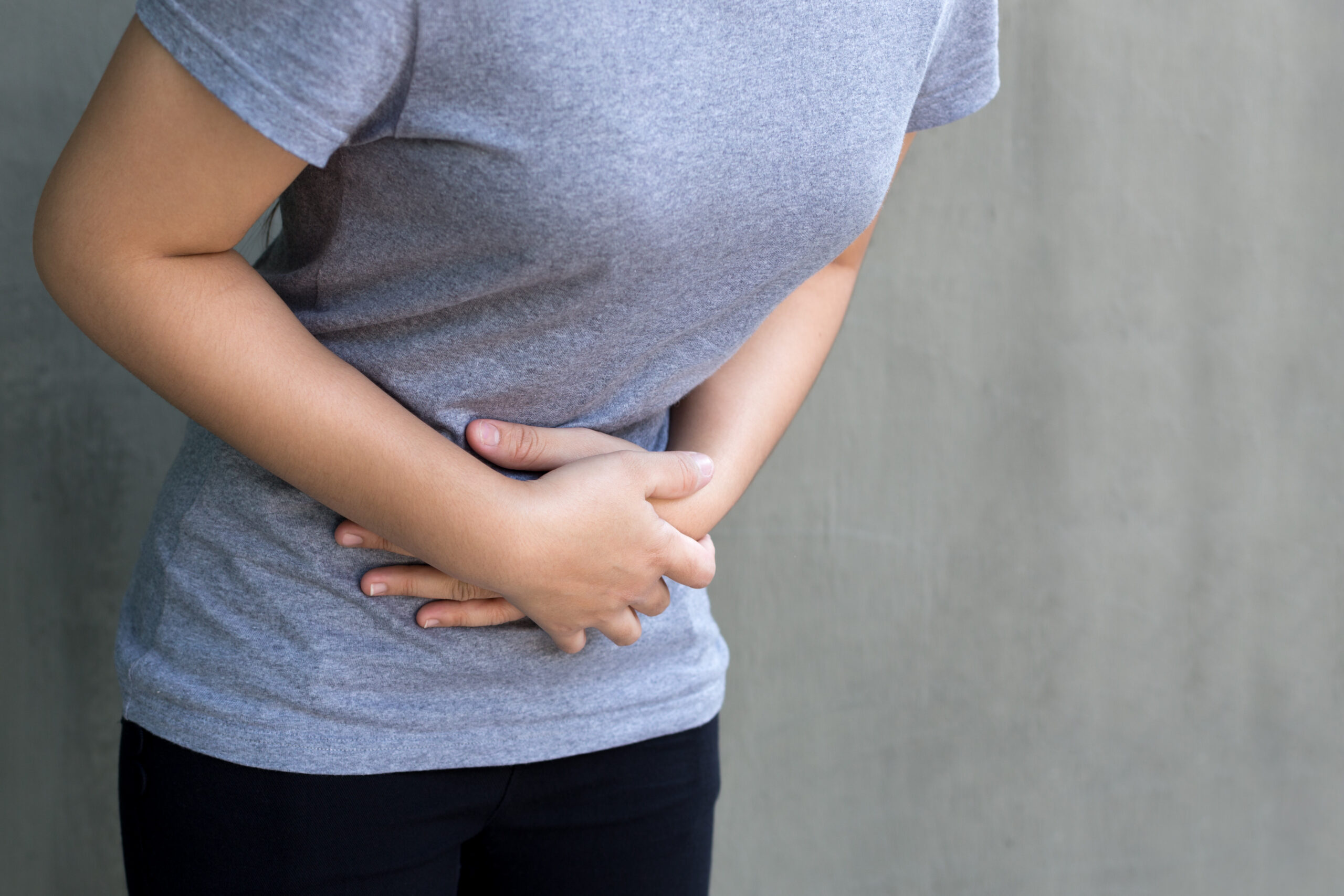 Young woman having a menstruation pain