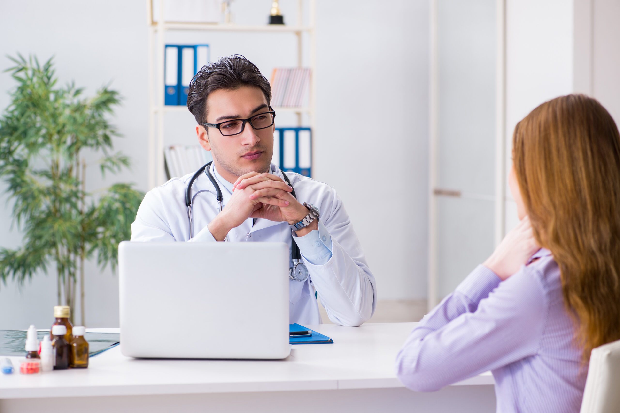 Patient visiting doctor for medical check-up in hospital