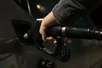 Man pumping gas