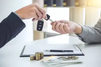 Salesman send key to customer after good deal agreement, success