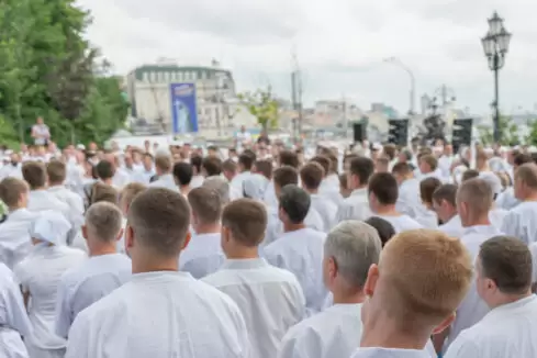 Meeting of people in white clothes