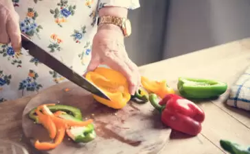 Woman slicing fruit