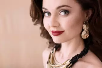 beautiful woman with a necklace and earrings