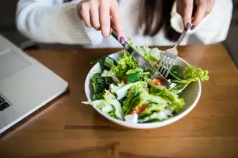 woman eating a salad