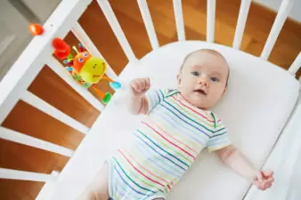 Baby sleeping in crib