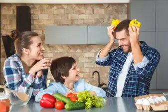 man being goofy with his family